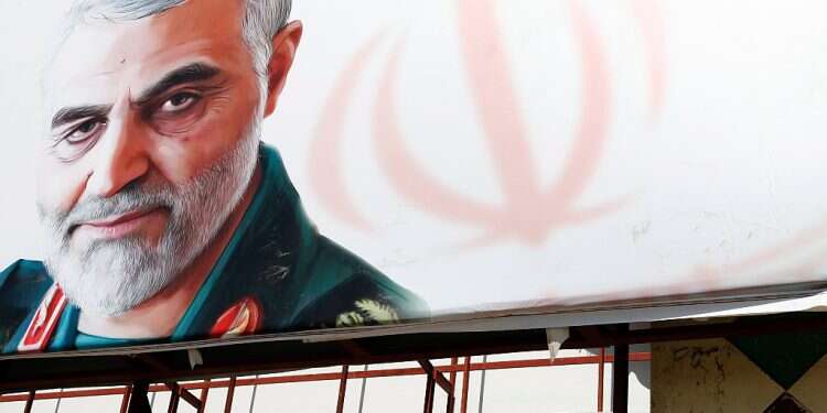 A huge banner displays the image of the late commander of Iran's Quds Force, Maj. Gen. Qassem Soleimani, who was killed in a US drone strike in January 2020 Senior Hamas official describes receiving $22M in cash from Iran's Soleimani