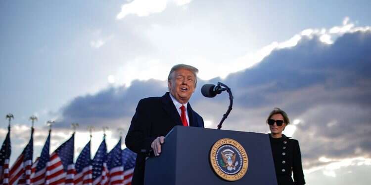 Trump bids farewell to Washington, hints of comeback