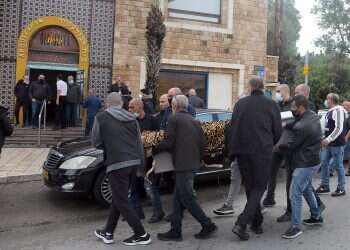 Worldwide COVID death toll nears 2 million