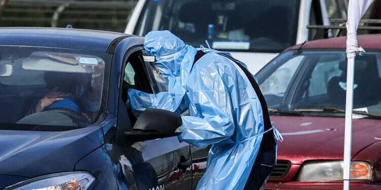 COVID testing is conducted at a drive-through site on Wednesday, Jan. 6 Nearly 7,600 new COVID cases reported as 3rd lockdown begins