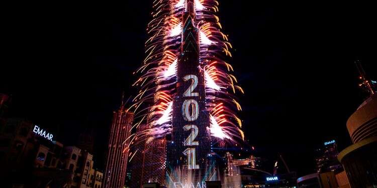 The Burj Khalifah tower in Dubai during the celebrations on December 31, 2020 2021: The year of the vaccine