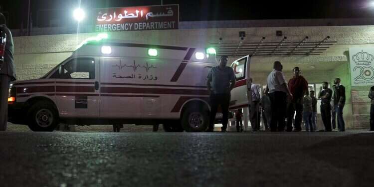 An ambulance is parked in front of the Jerash Government Hospital, where people stabbed in a 2019 knife attack were taken Jordan announces death sentence for Palestinian who wounded 8 in stabbing attack