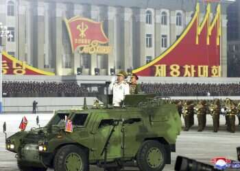 N. Korea holds huge military parade as Kim vows nuclear might