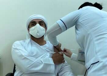 Dubai cancels non-essential surgery, live entertainment as COVID cases spike