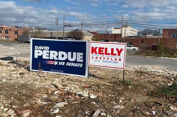 Signs for Republican Senators David Perdue and Kelly Loeffler Georgia: Trump's last battle