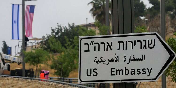 A road sign points the way toward the US Embassy in Jerusalem US Senate votes 97-3 to keep US Embassy in Jerusalem