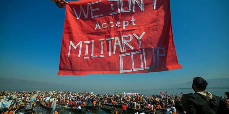 Protesters wearing traditional Shan dress take part in a demonstration against the Myanmar military coup in Inle lake, Shan, Feb. 11, 2021 Biden orders sanctions against Myanmar after military coup