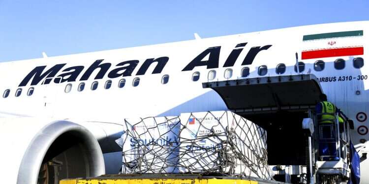 Russian-made Sputnik V coronavirus vaccines are being unloaded at the Tehran's Imam Khomeini International Airport, Thursday Iran receives its first batch of foreign COVID vaccine