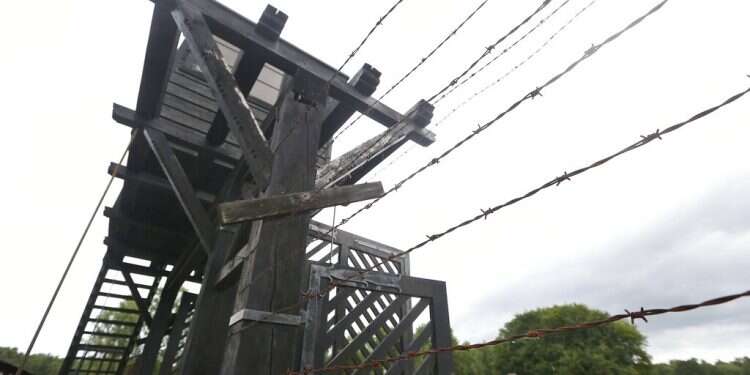The wooden main gate leads into the former Nazi German Stutthof concentration camp in Sztutowo, Poland Former secretary of Nazi commandant charged as accessory in 10,000 murders