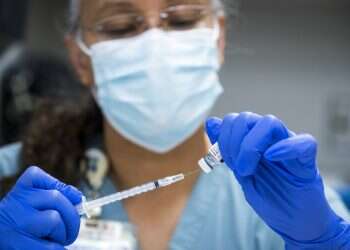 Average US virus cases below 100K for first time in months