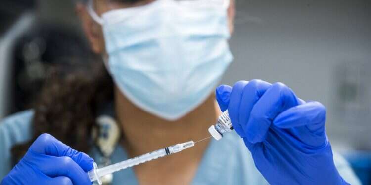 Average US virus cases below 100K for first time in months