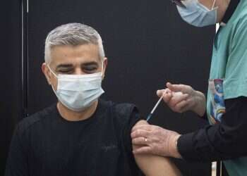 UK speeds up vaccinations with goal to jab all adults by July 31