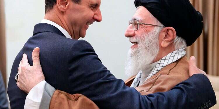 Syrian President Bashar Assad and Iranian Supreme Leader Ayatollah Ali Khamenei in Tehran, Feb. 25, 2019 Syria condemns 'cowardly' US airstrikes on Iran-backed militias