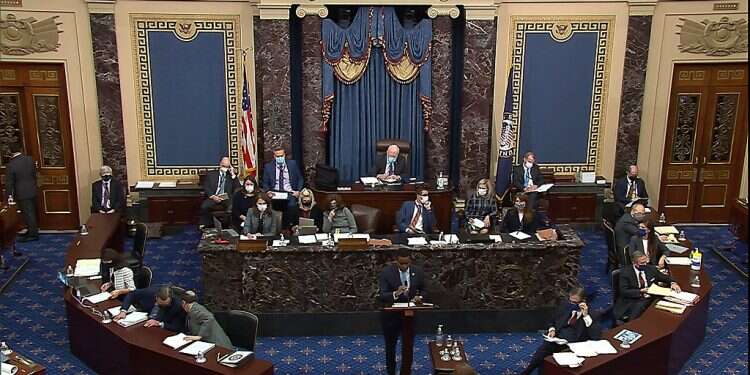 House impeachment manager Rep. Joe Neguse, D-Colo., speaks during the second impeachment trial of former President Donald Trump in the Senate, Feb. 10, 2021 Senate acquits former President Donald Trump of inciting riot at US Capitol