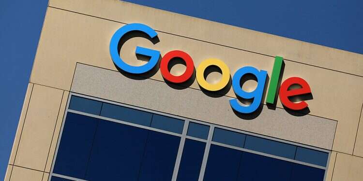 The Google logo is seen on an office building in Irvine, CA, in 2017 Google to cut app store fee by half on developers' first $1M