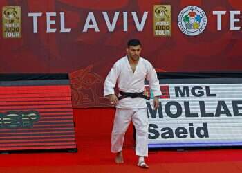 Exiled Iranian judoka Saeid Mollaei arrives to competes in the men's under 81kg category of Tel Aviv Grand Slam 2021 in Tel Aviv, Feb. 19, 2021 Sports court lifts Iran judo suspension over Israel policy