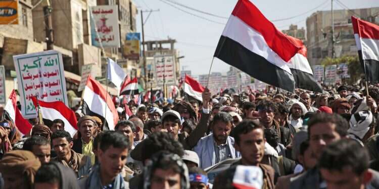 Houthi supporters attend a rally marking six years for a Saudi-led coalition in Sanaa, Yemen, March 26, 2021 Houthis expel Yemen's last Jewish families