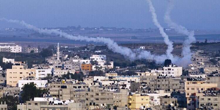 Palestinian terrorists fire rockets at Israel from Gaza City, Aug. 21, 2014 Advocacy group Ad Kan takes apart NGO's claims of IDF abuses