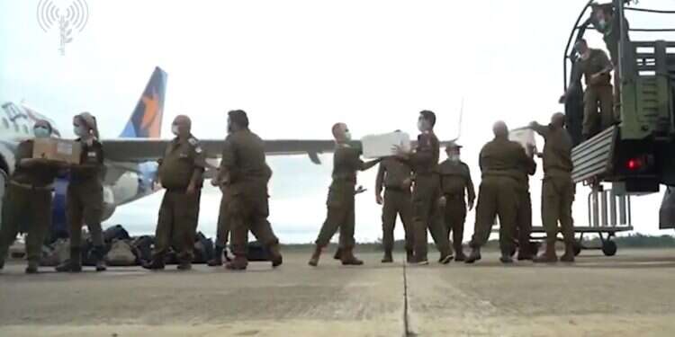 IDF medical personnel load medical supplies on March 11, 2021, to treat victims of explosions in Bata, Equitorial Guinea Israeli delegation arrives in E. Guinea to treat wounded after deadly blasts