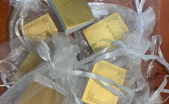 The miniature books labeled 'Psalms' in Hebrew actually contain the text of the New Testament, in English Israeli dollar store mistakenly sells New Testaments instead of Psalms