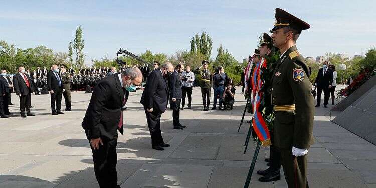 Armenian President Armen Sarkissian and PM Nikol Pashinyan attending a ceremony at the Tsitsernakaberd Armenian Genocide Memorial complex in Yerevan, Armenia, April 24, 2021 Biden recognizes atrocities against Armenians as genocide