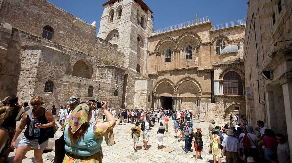 Tourists flock to the Church of the Holy Sepulchre in the Old City of Jerusalem Cutting-edge tech takes a closer look at crosses cut into Holy Sepulchre walls