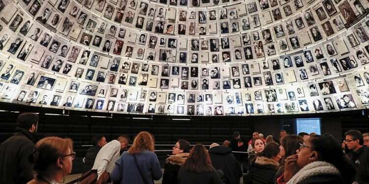 Visitors walk at the Hall of Names at the Yad Vashem Holocaust Memorial useum in Jerusalem on Jan. 21, 2020
Israel's Holocaust survivor population dwindling daily