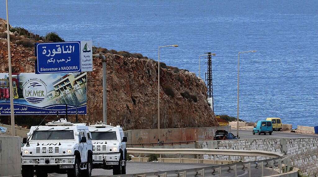 United Nations peacekeeping force vehicles patrol the coastal road to Naqura, the southernmost Lebanese town by the border with Israel, on October 13, 2020 Report: Israel, Lebanon to resume talks on maritime border dispute