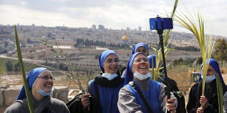 Christians mark Good Friday in Jerusalem as pandemic winds down