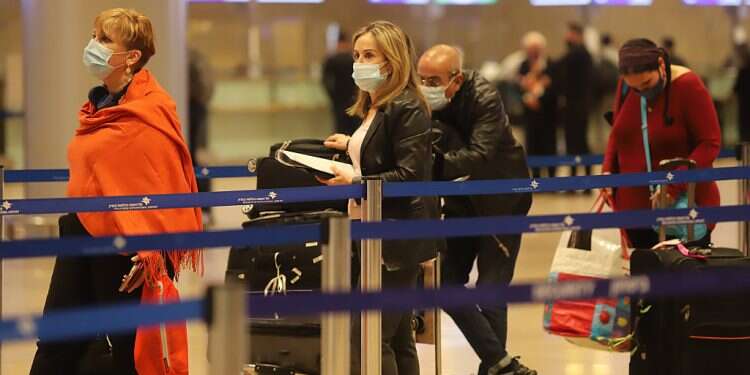 Passengers at Israel's Ben-Gurion International Airport Health Ministry introduces new quarantine measures as variants spread