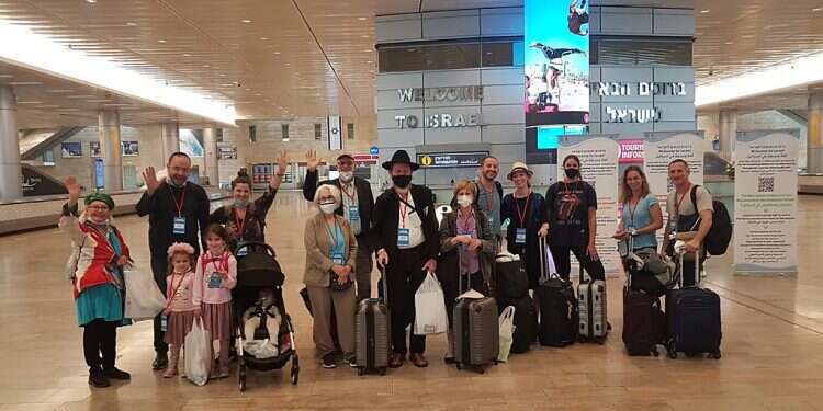 New olim at Ben-Gurion INternational Airport after their arrival in Israel in May 2021 As rockets land, so do olim who want to make Israel home