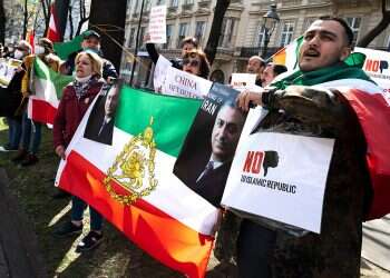 Members of the National Council of Resistance of Iran protest outside the Grand Hotel in Vienna which hosts the nuclear talks with Iran on April 9, 2021 Iranian sentenced to 20 years in Belgium over terrorism