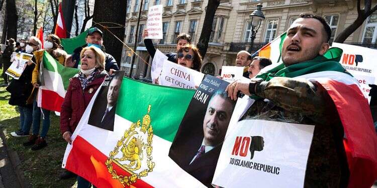 Members of the National Council of Resistance of Iran protest outside the Grand Hotel in Vienna which hosts the nuclear talks with Iran on April 9, 2021 Iranian sentenced to 20 years in Belgium over terrorism