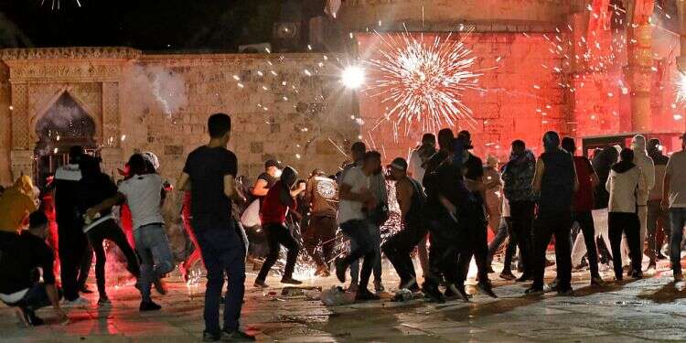 Arab rioters use fireworks during clashes with Israeli police officers Fire erupts at Al-Aqsa compound in apparent fireworks accident