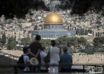 Tourists visit the Mount of Olives in Jerusalem Tourism Ministry: Jerusalem proves hottest tourist destination in 2020