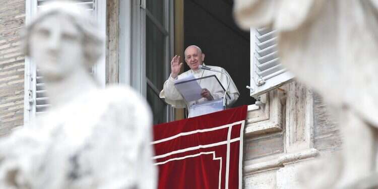 Pope Francis waves after delivering the Regina Caeli noon prayer from the window of his studio overlooking St.Peter's Square, at the Vatican, May 2, 2021 Pope prays for Meron stampede victims
