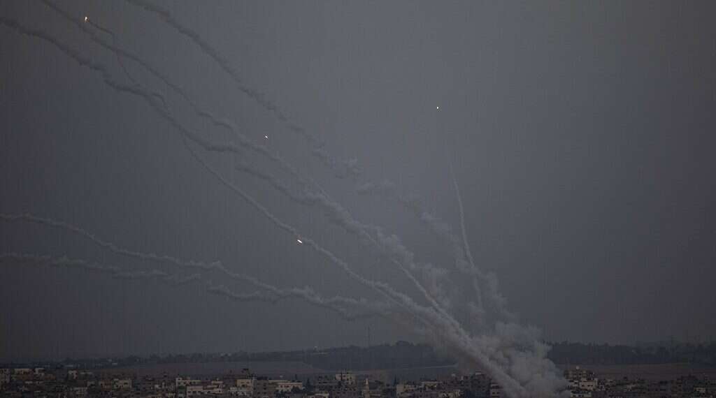 Rockets are launched from the Gaza Strip towards Israel, at dusk Monday, May 10, 2021 Netanyahu says terrorists 'crossed red line,' Israel will respond 'with massive force'