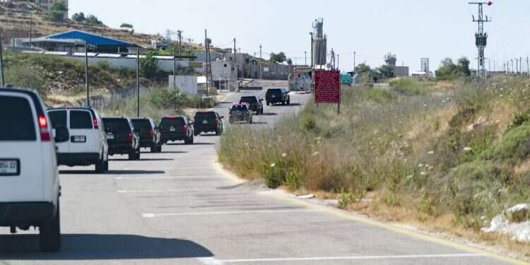 The motorcade for Secretary of State Antony Blinken approaches the Beitunia checkpoint to enter the West Bank city of Ramallah, Tuesday, May 25, 2021 Qatar pledges $500M to rebuild Gaza, Hamas vows transparency