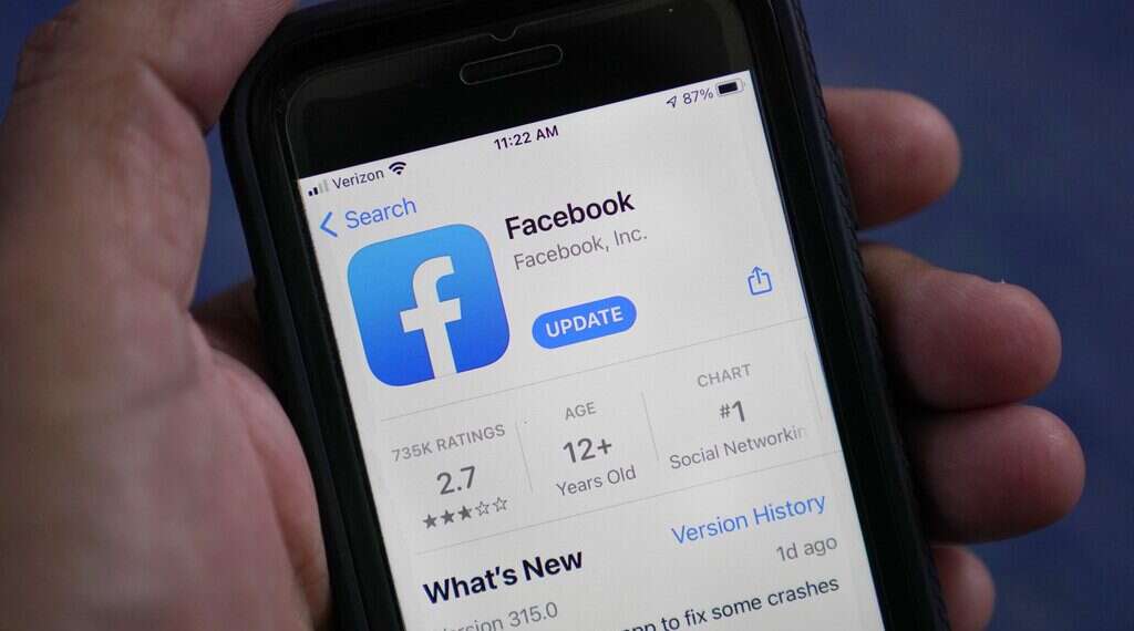 The Facebook app is shown on a smart phone, April 23, 2021 Israeli media outlets urge Twitter, Facebook to stop anti-press hate