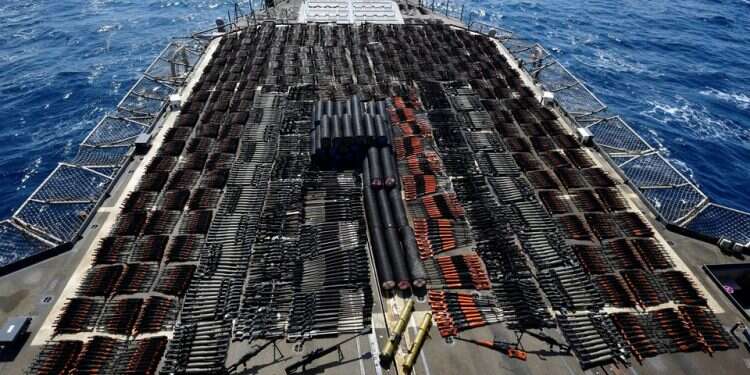 Thousands of illicit weapons are displayed onboard the USS Monterey after they were seized from a stateless dhow in international waters of the North Arabian Sea, May 9, 2021 US seizes massive weapons shipment from Iran to Yemen's Houthis