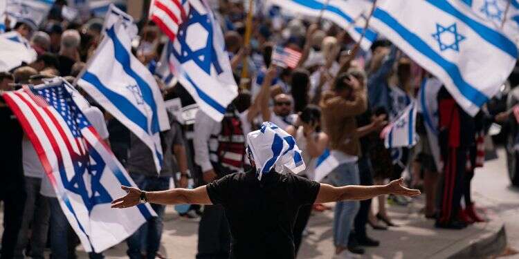 Pro-Israel demonstrators gather outside the Federal Building during a rally in support of Israel in Los Angeles, May 12, 2021 To confront antisemitism, advocates say it's time for Jews to unite, take action