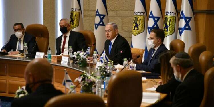 Prime Minister Benjamin Netanyahu speaks during the weekly cabinet meeting Netanyahu says Israel rejects pressure on Jerusalem, warns terrorists not to escalate