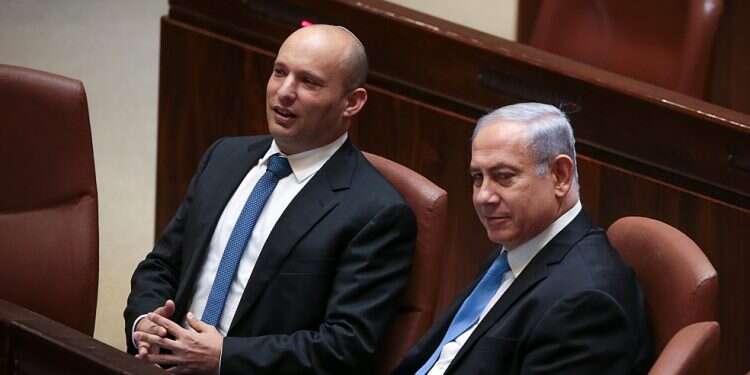 Yamina leader Naftali Bennett and Prime Minister Benjamin Netanyahu in the Knesset plenum Bennett bails on unity government with Lapid due to security situation