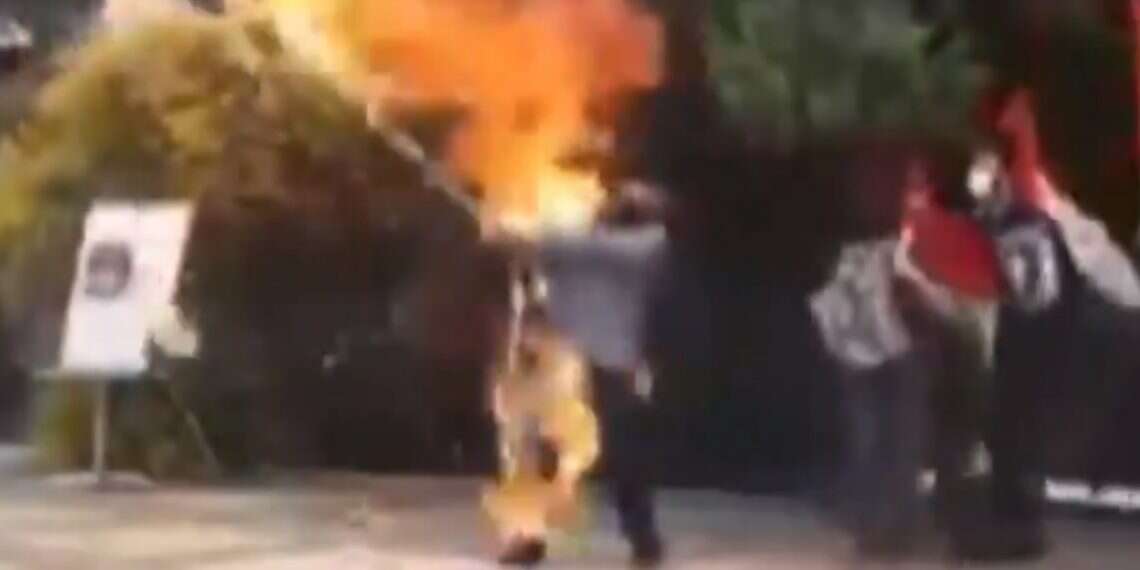 Iranian tries to burn Israeli flag, sets himself on fire