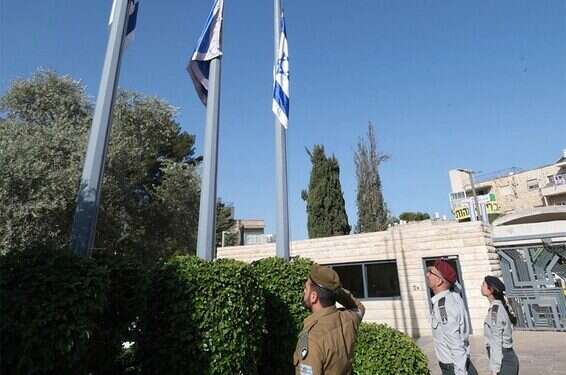 Israelis flags at the President's Residence in Jerusalem are lowered to half-mast Israel marks national day of mourning for Meron victims