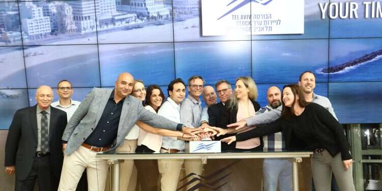 R-L: Ella Shechtman, VP HR Nayax; Moshe Orenstein, VP product Nayax; Saffi Keisari, Development Manager Nayax; Keren Sharir, VP Marketing Nayax; Amir Nechmad, Co- Founder Nayax; Yair Nechmad, CEO, Chairman & Co- Founder Nayax; David Ben-Avi, Chief Technology Officer Nayax; Liron Grosman, CEO Nayax; Tami Erel, Chief Business Operations Nayax; Michael Galai, Chief Legal Officer Nayax; Ittai Ben-Zeev, CEO TASE and Amnon Neubach, Chairman TASE Israeli fintech unicorn Nayax marks record IPO on TASE