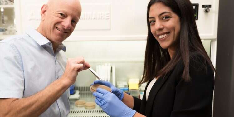 Ben-Gurion University researchers Dr. Raz Jelinek and Dr. Ravit Malishev BGU researchers use 'tweezers' to battle global health threat