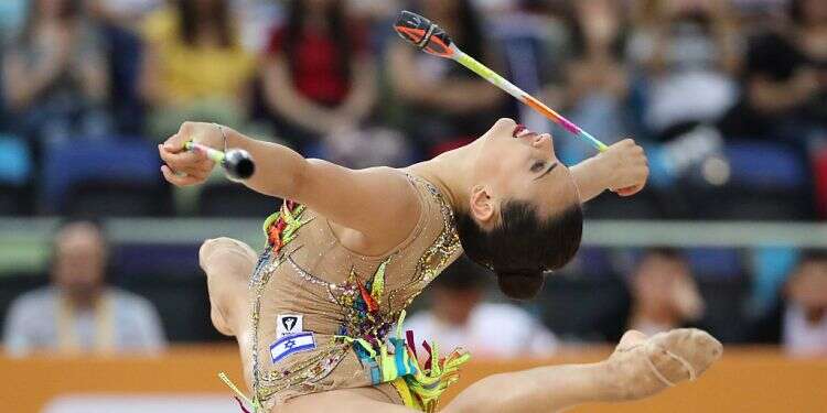Linoy Ashram during the clubs' exercise at the World Rhythmic Gymnastics Championships in Baku, Azerbaijan, Sept. 20 2019 Linoy Ashram wins gold, 2 silver medals in European Gymnastics Championship