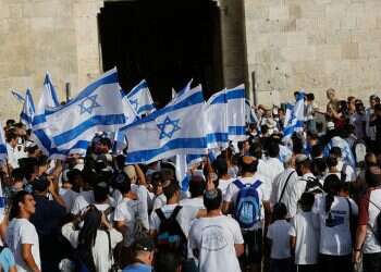 Flag march held in Jerusalem amid riots in city, threats from Hamas