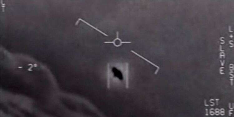 Part of an unclassified video taken by Navy pilots that have circulated for years showing interactions with 'unidentified aerial phenomena' The truth is still out there? US intel report on UFOs inconclusive